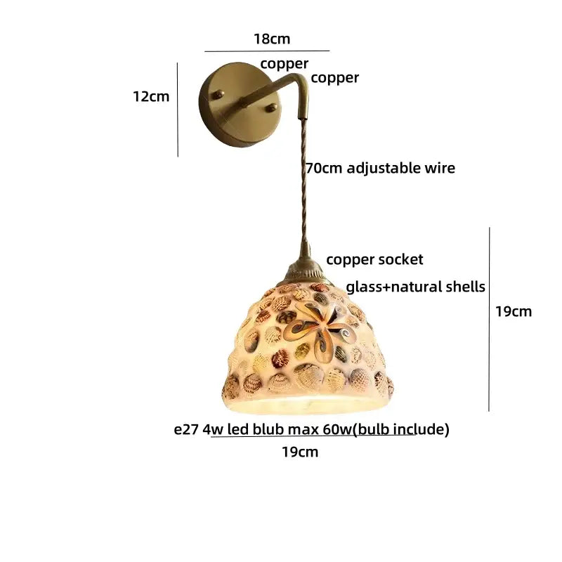 Decorbites amber glass led wall lights featuring a decorative copper sconce with seashells and adjustable wire height