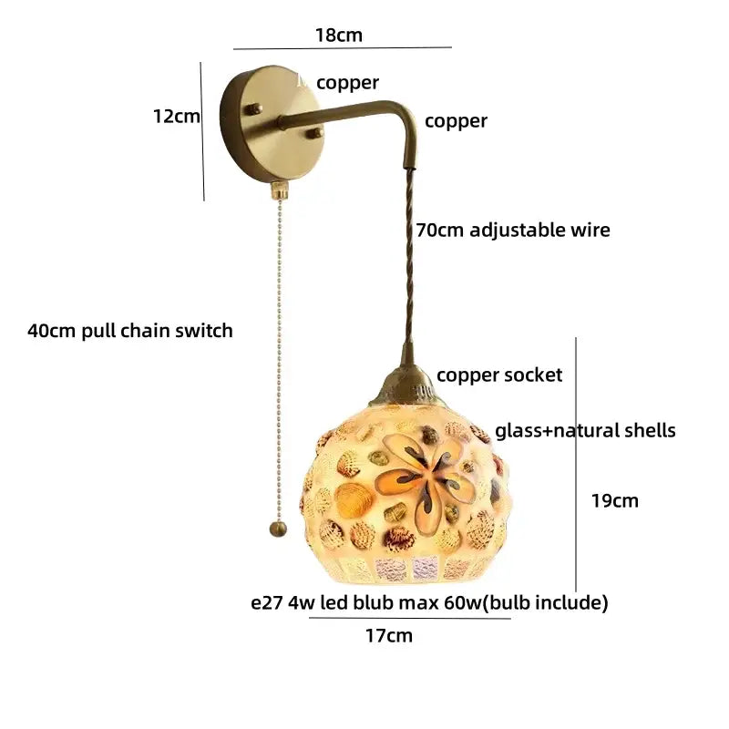 Decorbites amber glass led wall light with brass copper arm and ornate glass globe featuring natural shell floral patterns