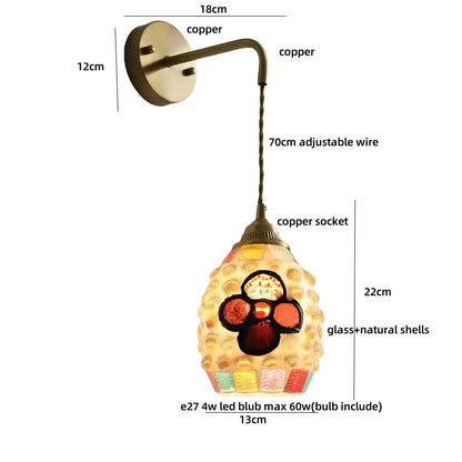Decorbites amber glass led wall lights featuring a copper bracket and ornate shell-adorned amber glass shade for home décor