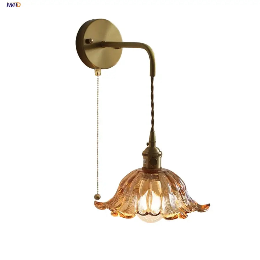 Antique brass wall sconce with decorbites amber glass led flower-shaped shade and adjustable wire in modern nordic style