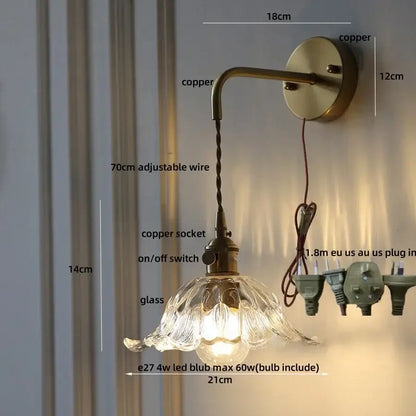 Antique brass-finished decorbites amber glass led wall sconce with petal-shaped glass shade and adjustable wire