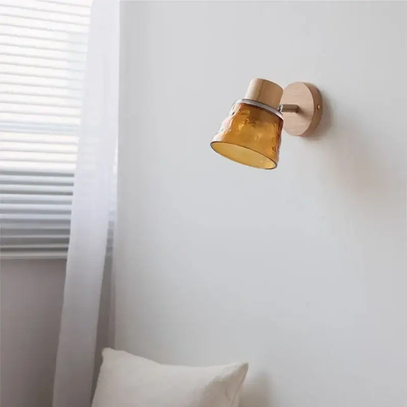 DecorBites amber glass led wall sconce with warm amber glass, wooden base and arm, textured finish, pull chain switch
