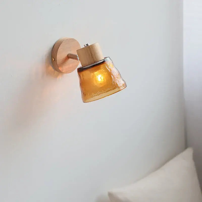 Warm amber-colored hammered glass wall sconce with light wood fixture decorbites amber glass led stair light