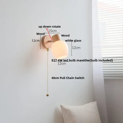 Minimalist wall sconce with decorbites amber glass led white shade light wood finish and brass pull chain switch