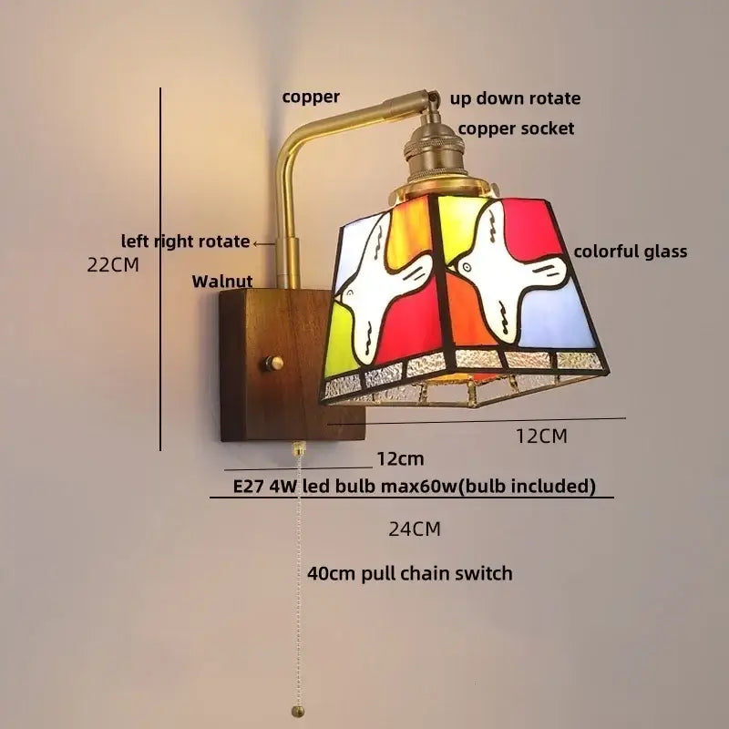 DecorBites amber glass wall sconce with walnut wood base features colorful stained glass doves and a pull chain switch