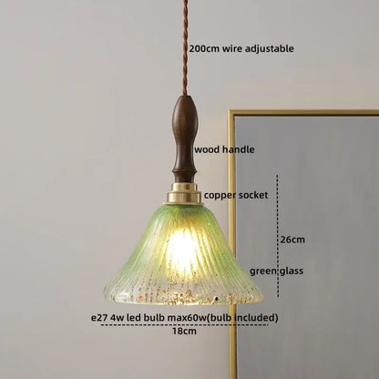 Vintage-style decorbites amber glass pendant with textured green glass shade, dark wood handle, and brass copper socket