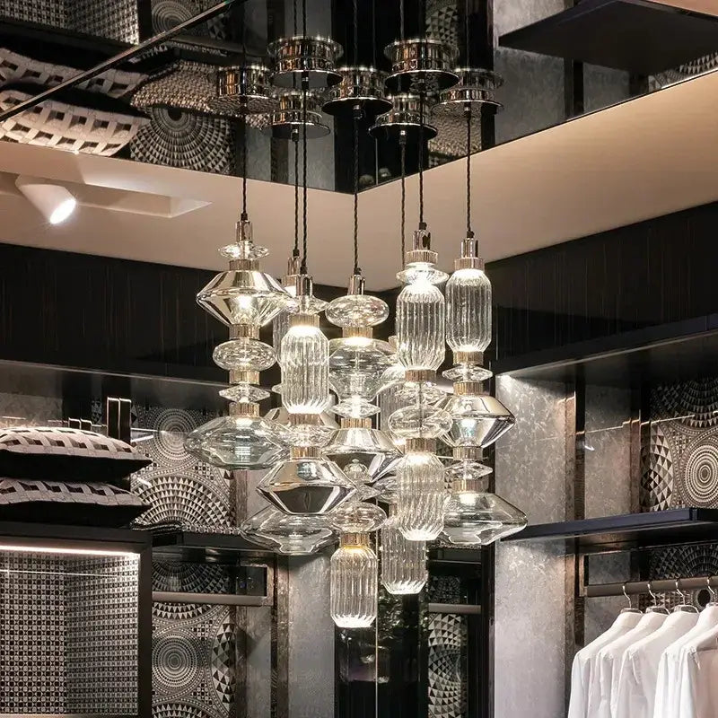 Decorbites amber glass pendant light with multi-tiered clear glass and metallic accents for hotel bedroom and bar