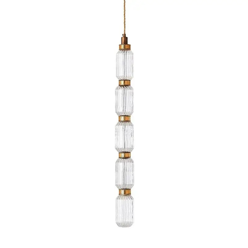 Clear faceted glass pendant light with brass accents and gold toned cord by decorbites amber glass for vintage style interiors