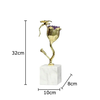 Gold-plated dragonfly decor sculpture with a purple amethyst flower mounted on a white marble base by decorbites