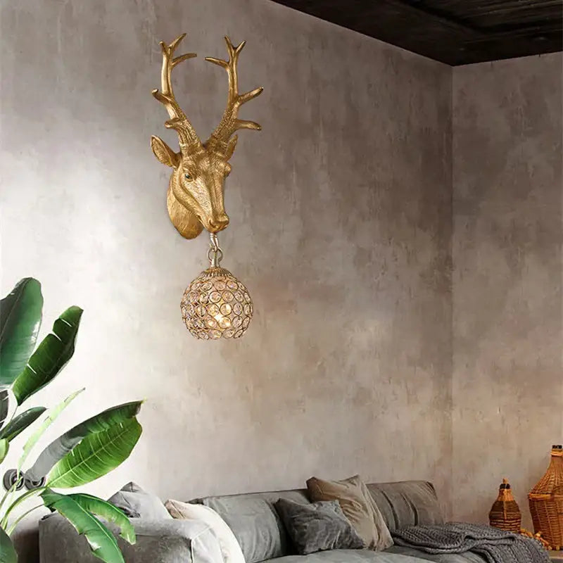 Golden deer head wall sconce with crystal-encrusted globe pendant led wall lights for home bedroom decor by decorbites