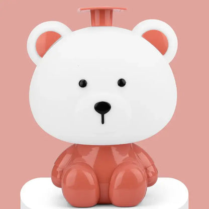 Decorbites™ animal light bear-shaped liquid soap dispenser with white and coral colors and matching orange pump top
