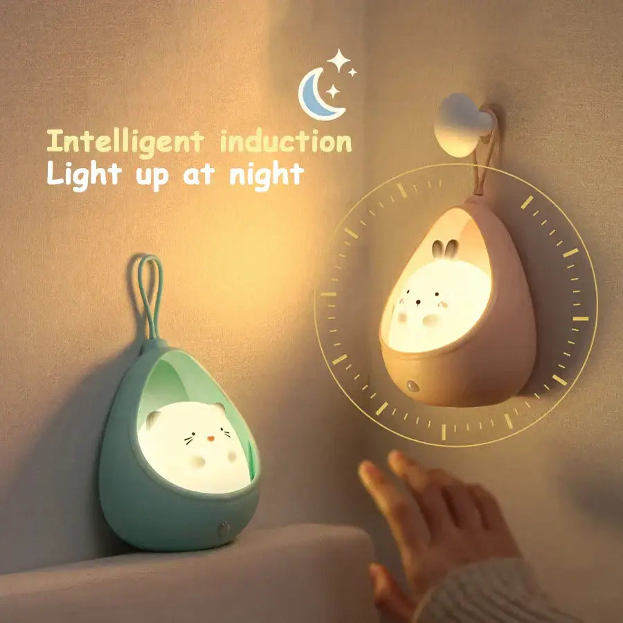 Cute teal and white silicone cat-shaped animal night light with soft glow usb rechargeable and sensor control for kids