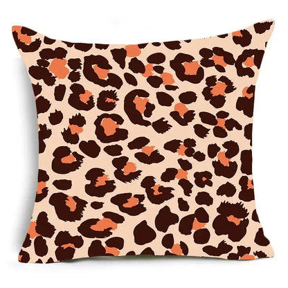 A square animal print pillowcase cushion cover with bold leopard print in dark brown orange on beige for sofa decor
