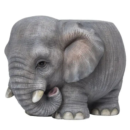 Gray elephant figurine with textured skin and pink inner ear animal resin sculpture footstool seat for living room