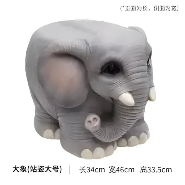Gray elephant resin sculpture footstool seat featuring a baby elephant nestled under trunk for decorbites creative use