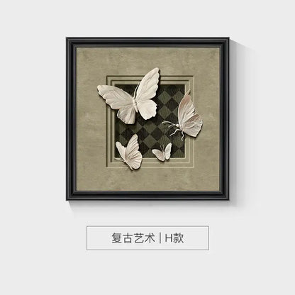 A decorbites™ animal wall decor frame set featuring off-white 3d butterfly sculptures on beige textured background