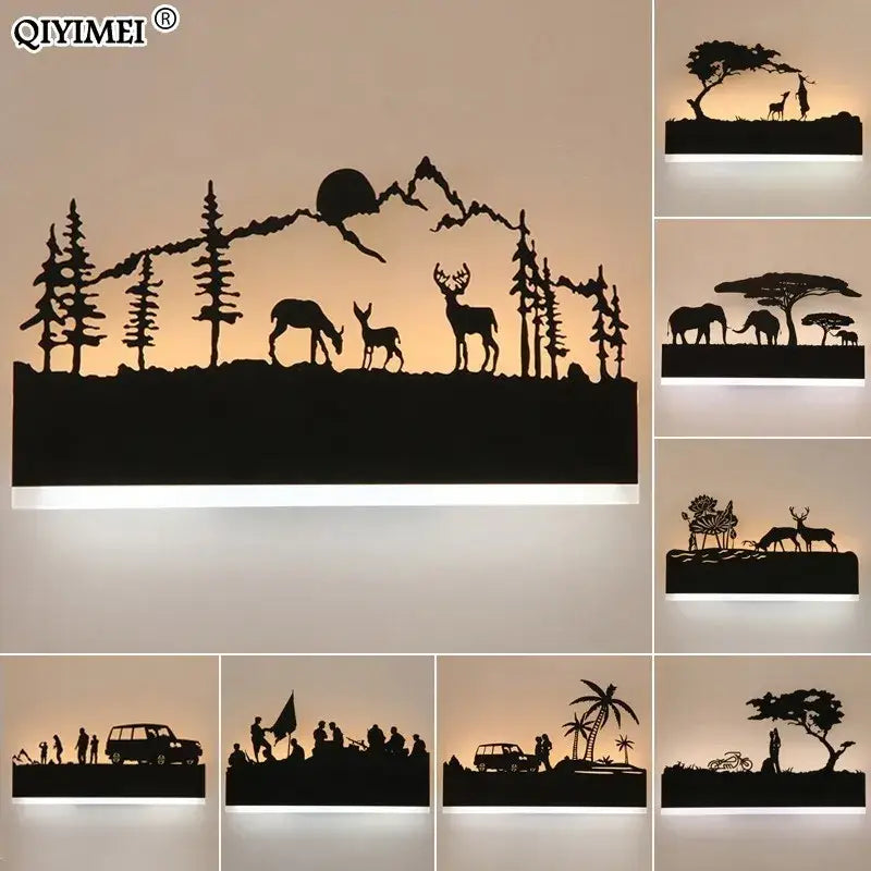 Black metal silhouette animal wall lamp featuring deer trees and mountains with upside warm down cool lighting for living room
