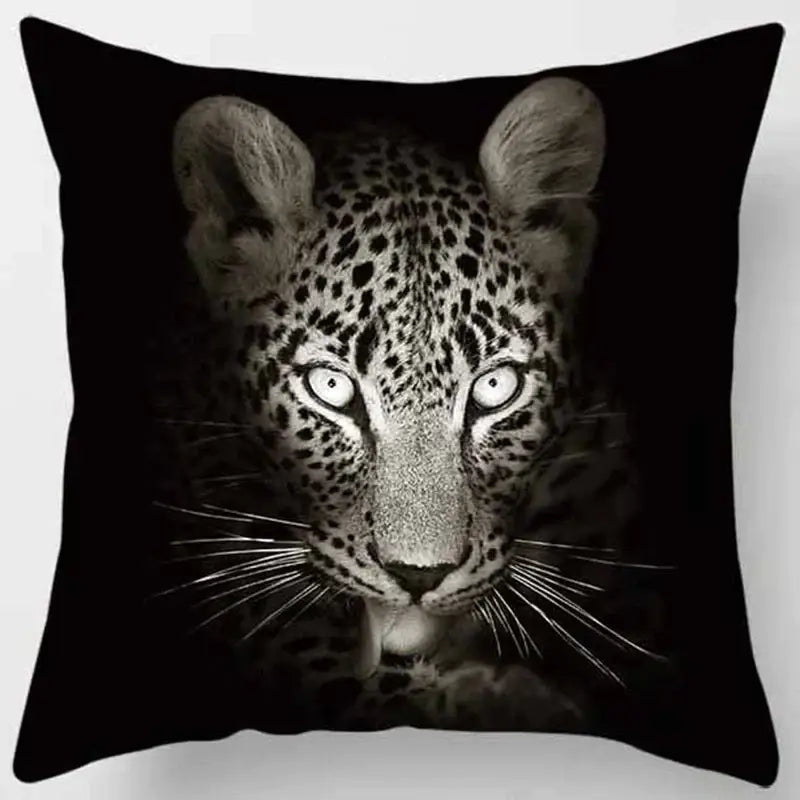 Black throw pillow case from decorbites animals world featuring a black and white leopard face with glowing eyes for living room