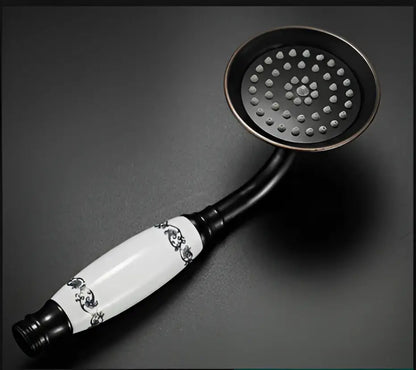Decorbites antique bathroom handheld shower head with black and white ceramic and ornate floral handle detailing