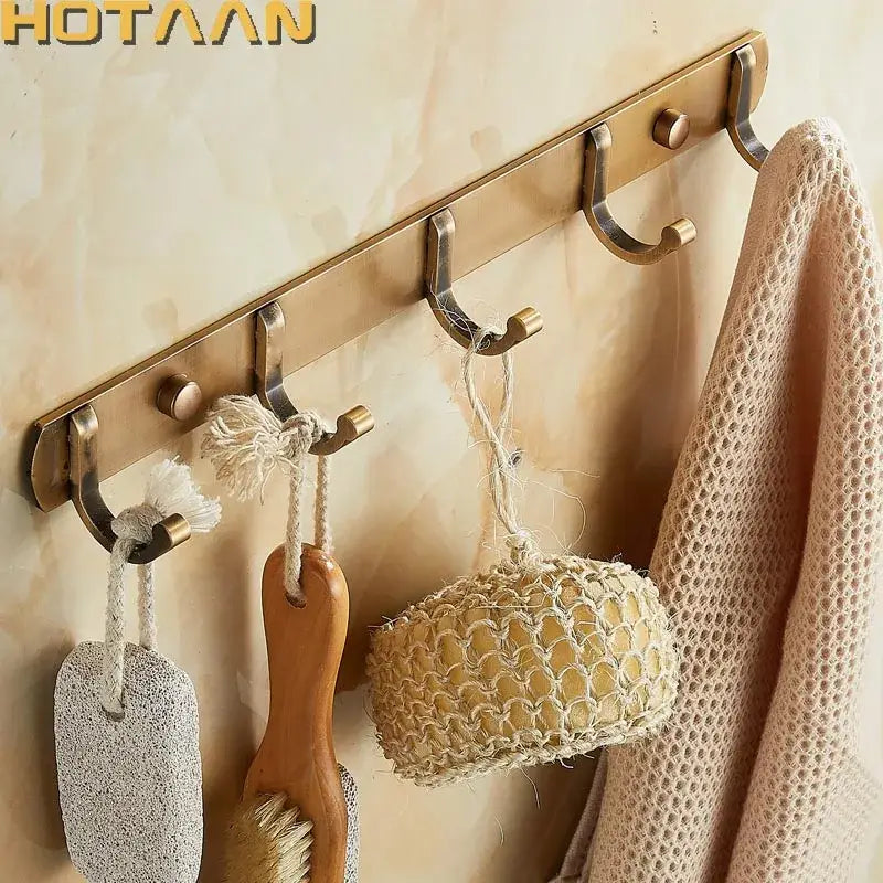 Brass-colored wall-mounted hook rack with five hooks and round knobs for decorbites antique black robe hook bathroom use