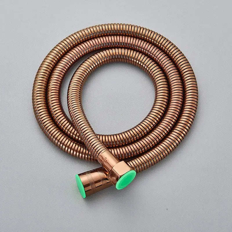 Decorbites antique brass 59 inch copper-colored flexible hand shower hose with ribbed texture and bright green caps