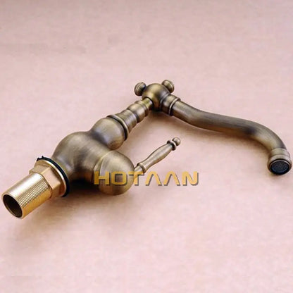 DecorBites™ antique brass basin faucet with ornate vintage design and single lever handle for bathroom use