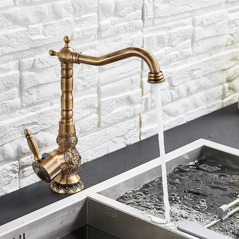 DecorBites antique brass basin faucet with ornate flower carving and long curved spout with 360 rotation