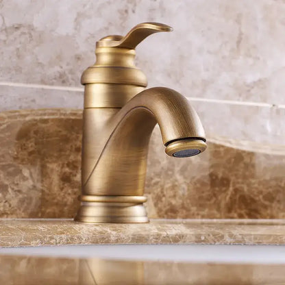 Decorbites antique brass basin faucet with single handle curved spout and ridged base for bathroom sink mixer