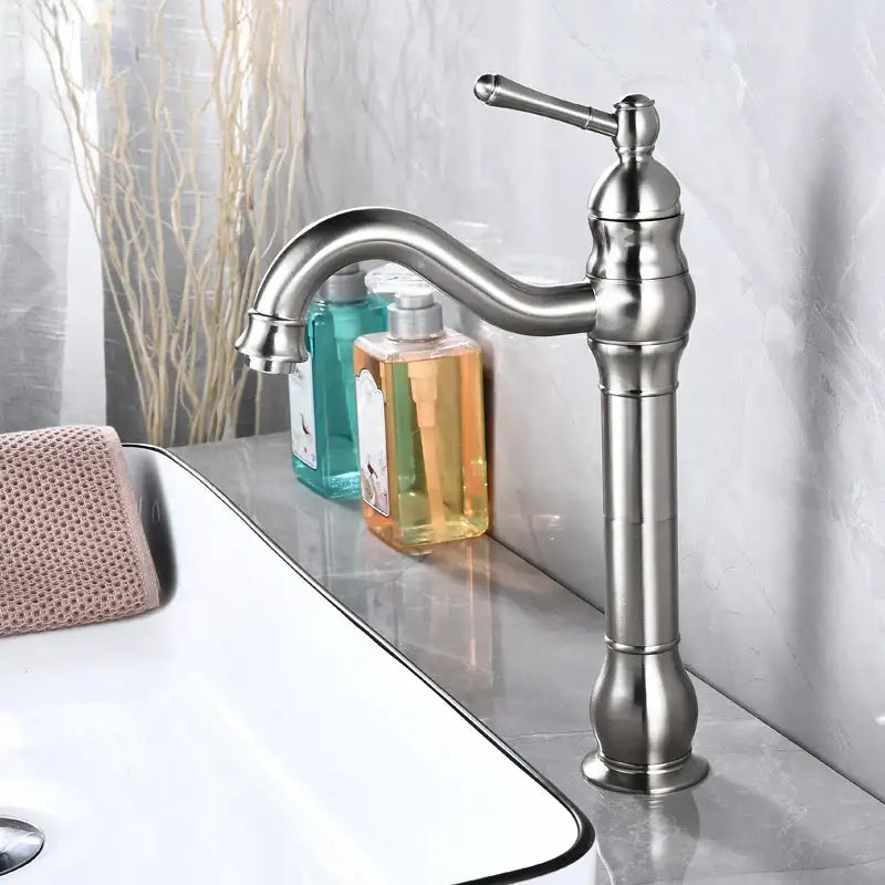 Stylish decorbites antique brass basin faucet with brushed nickel single-handle and elegant curved spout