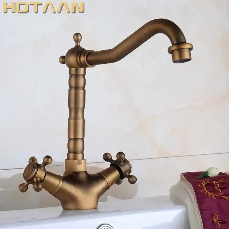 DecorBites antique brass basin faucet with swivel spout and ornate cross handles in vintage style