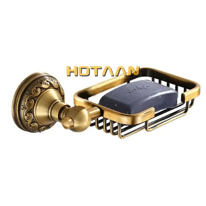 Decorbites™ antique brass soap dish holder with ornate scrollwork and wire mesh basket holding dark blue soap bar