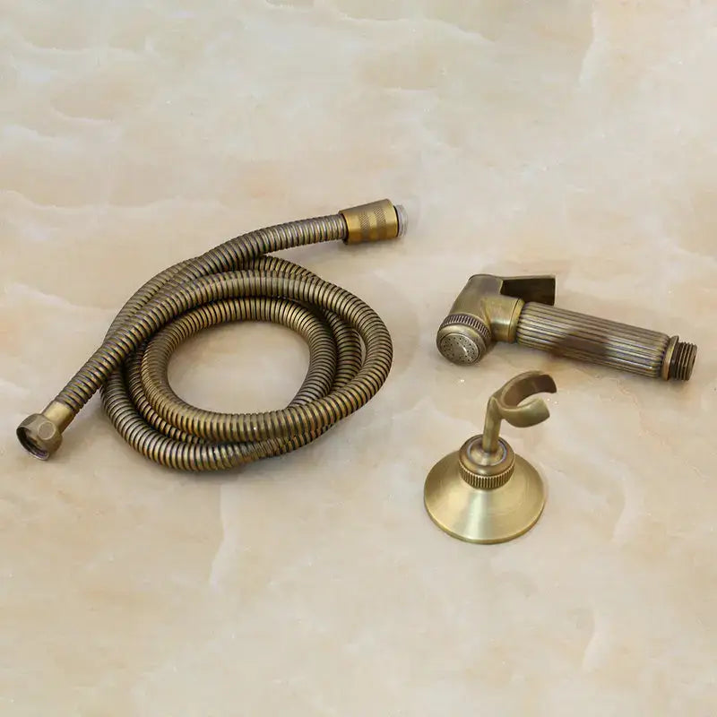 Decorbites™ antique brass bidet faucet wall mount with hand shower set featuring brass bidet faucet and matching bracket
