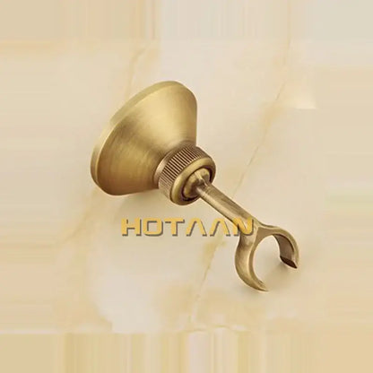 Antique brass curtain rod holder with flared base and textured knob complements decorbites antique brass bidet faucet set