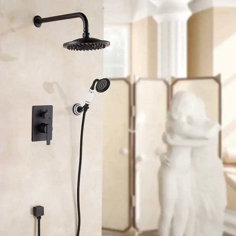 Black matte finish shower set with matching wall-mounted control panel and handshower in DecorBites antique brass black design