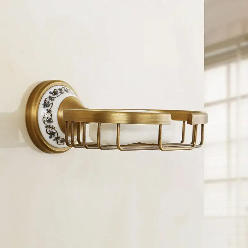 DecorBites™ antique brass ceramic soap dish with decorative white ceramic backplate and black floral patterns