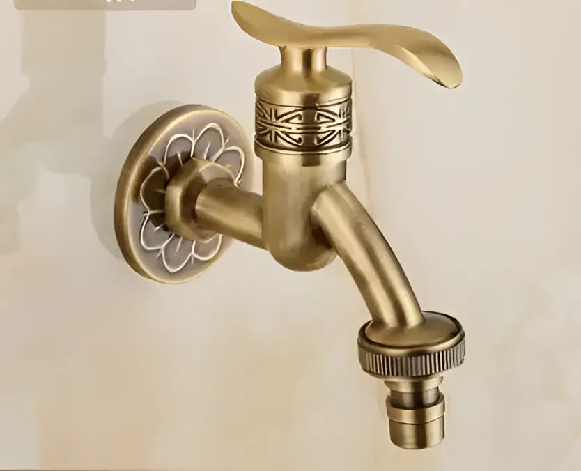 DecorBites™ antique brass dragon carved outdoor washing machine faucet with ornate floral design and engraved patterns