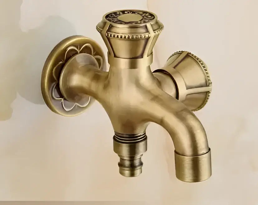 Antique brass dragon carved two-handle outdoor washing machine faucet with ornate fluted spout and vintage-style knob