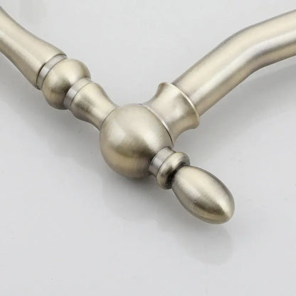 Decorbites antique brass dual handle swivel sink faucet with brushed nickel y-shaped ornate handle details