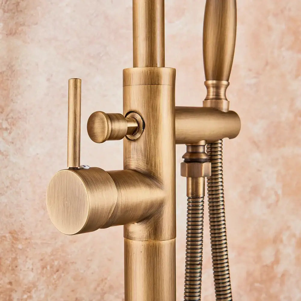 DecorBites™ antique brass floor mount tub faucet with swivel spout mixer tap and handheld showerhead on flexible hose