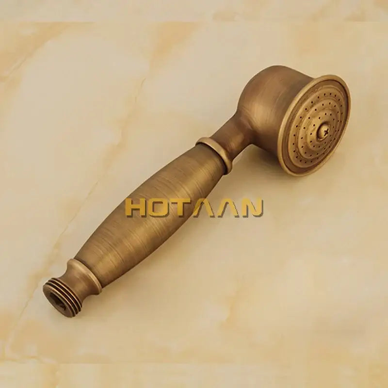 DecorBites™ antique brass shower head kit with a classic elongated handle and circular multi-nozzle spray face