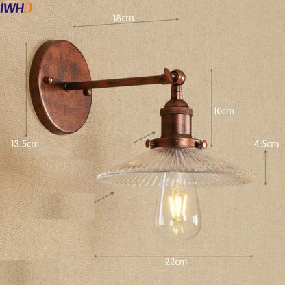Antique brass industrial wall sconce with clear ribbed glass shade and exposed edison bulb by decorbites vintage wall light