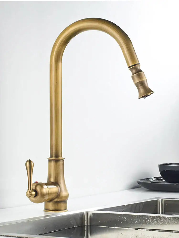 Antique brass kitchen faucet with high-arc swivel spout and lever handle for hot and cold mixer use