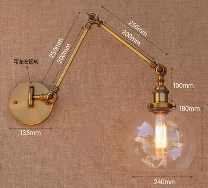 Decorbites antique brass wall lamp with swing arm and clear glass globe housing exposed filament bulb