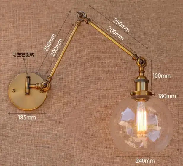 Decorbites antique brass wall lamp with swing arm and clear glass globe housing exposed filament bulb