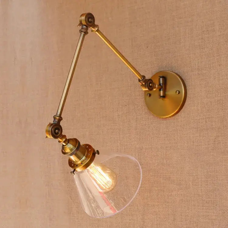 Decorbites antique brass loft industrial wall lamp with swing arm and clear glass shade featuring exposed filament bulb