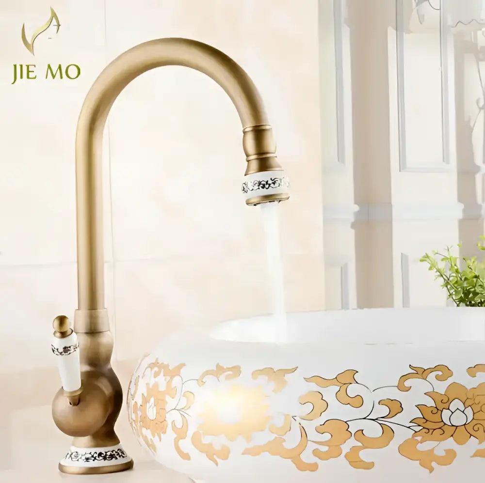 DecorBites antique brass porcelain basin mixer kitchen faucet with ornate white ceramic handle and silver inlay accents