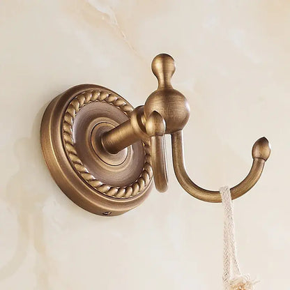 Decorbites antique brass robe hook with rope detailing and textured vintage finish for bathroom wall use