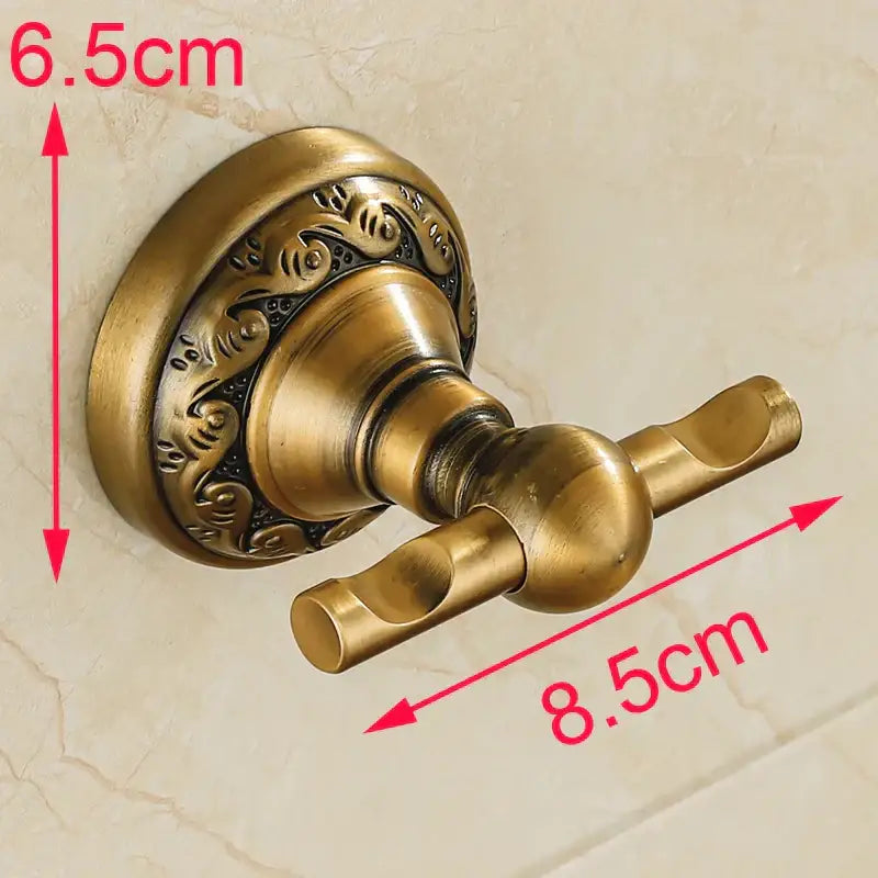 Decorbites™ antique brass robe hook with ornate scrollwork design made of durable aluminium for bathroom use