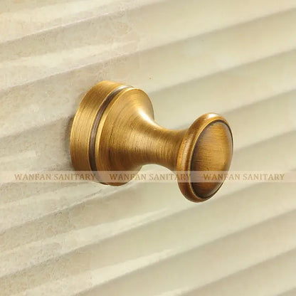 Decorbites antique brass robe hook with brass finish and classic rounded design for towels coats and clothes hanging