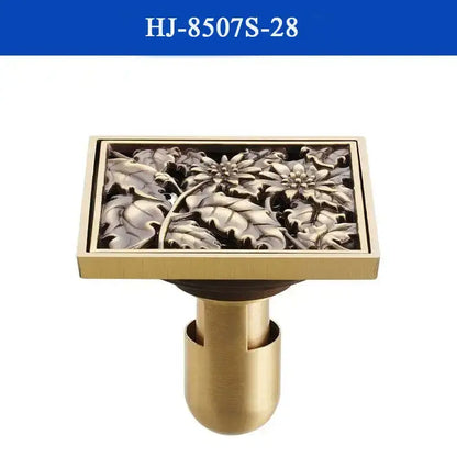DecorBites antique brass shower drain cover with intricate floral relief design in brass for bathroom use
